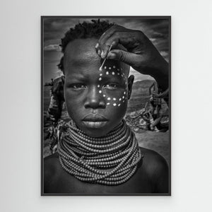 Painting the Face of a Karo Tribe Girl (Omo Valley-Ethiopia) by Joxe Inazio Kuesta Garmendia