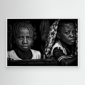 Two girls at school - Benin by Joxe Inazio Kuesta Garmendia
