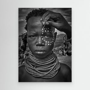 Painting the Face of a Karo Tribe Girl (Omo Valley-Ethiopia) by Joxe Inazio Kuesta Garmendia