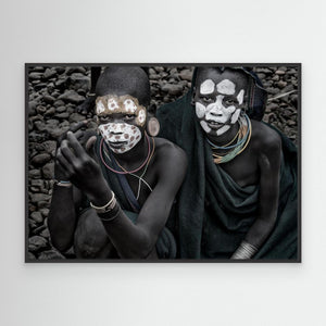 Two surmi girl painting in the bank of a river - Ethiopia by Joxe Inazio Kuesta Garmendia